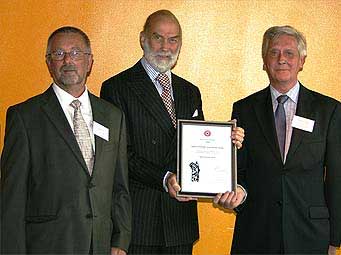 HRH Prince Michael of Kent presents the award to Richard Croucher (right) and Graham Drew (left)